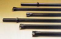 Integral drill steels